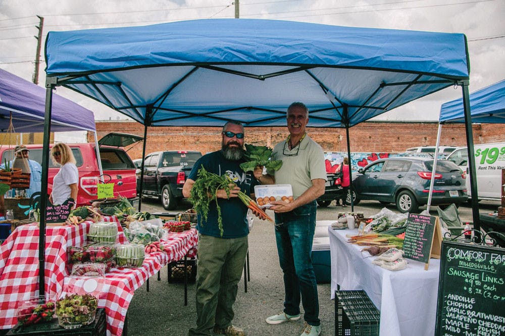 A Milledgeville farm sells their produce at the Macon Open Air Market. 
