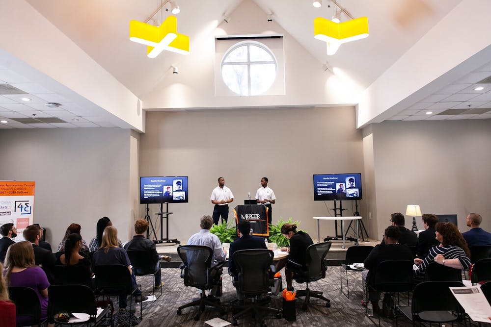 2019 Next Big Idea contestants Jabril Edmondson and DeShun Gilchrist pitched their haircare product business, Royalty Headwear. Photo courtesy of Professor of Management and Entrepreneurship Briana Stenard.