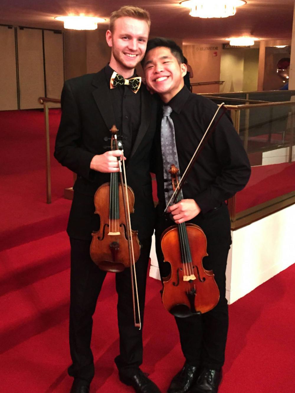 Michael Chong, right, and fellow Robert McDuffie Center student Keoni Bolding before a chamber performance at the Kennedy Center in Washington, D.C.