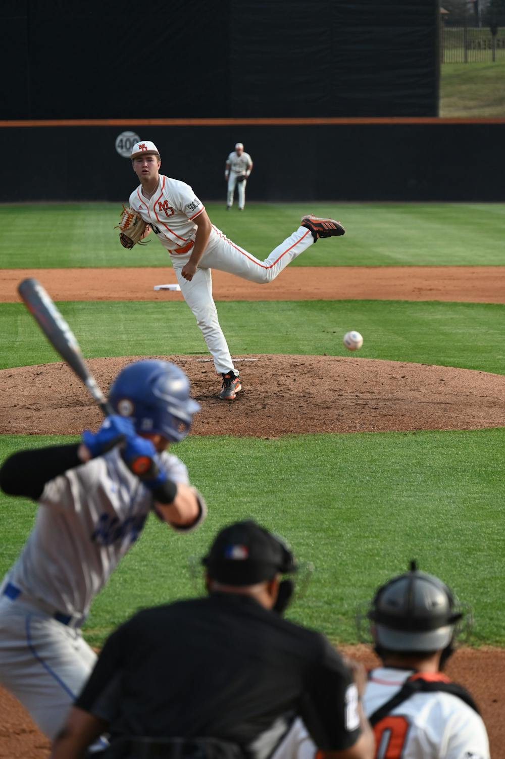 Mercer pitcher Colton Cosper (white) throws a strike to Griffin Cheney in the first inning of the game against Georgia State University. Cosper threw 69 pitches, let up zero runs, and struck out five GSU batters. 