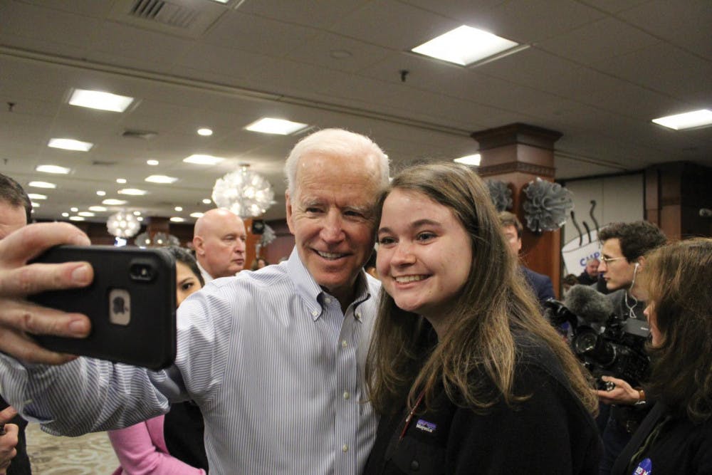Senior Emily Harvey poses for a selfie with Joe Biden.