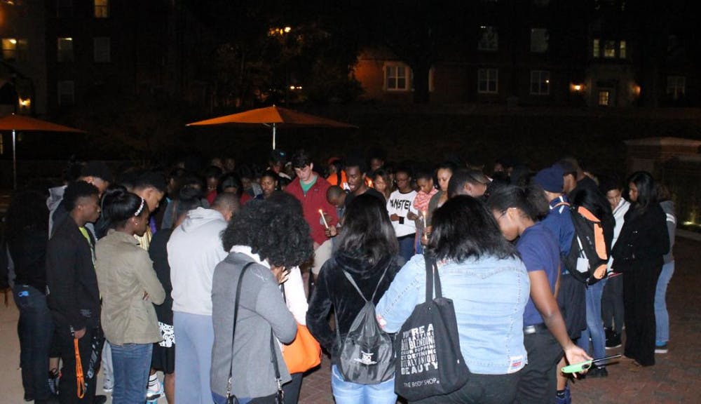 Mercer students host vigil to reflect on recent events at the University of Missouri.