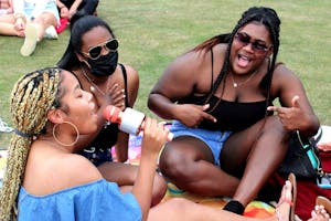 Left to right, Celisse Pompey, Jendai Sealey and Sariya Mathis dance and sing to DJ Saturn's act at Bearstock 2021.