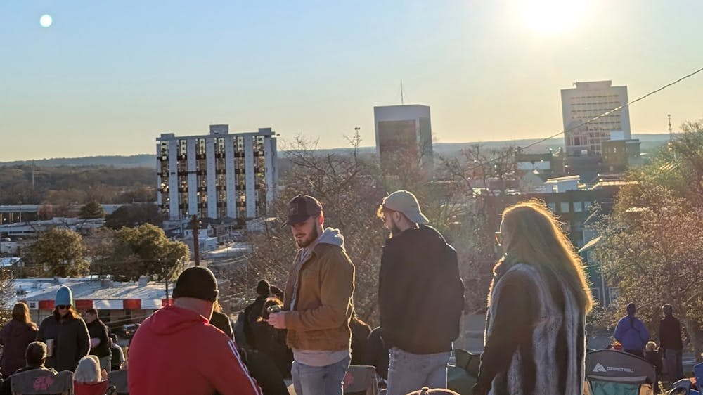 In the hour before Wednesday's implosion, crowds gathered on Coleman Hill to watch.