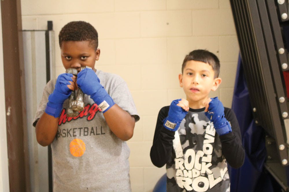 Two Macon boxers practice. 