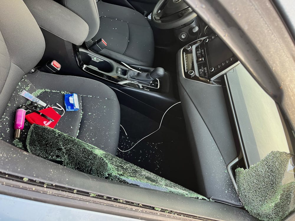 The interior of Sarah Awad's car after she discovered its broken window. Photo courtesy of Sarah Awad.