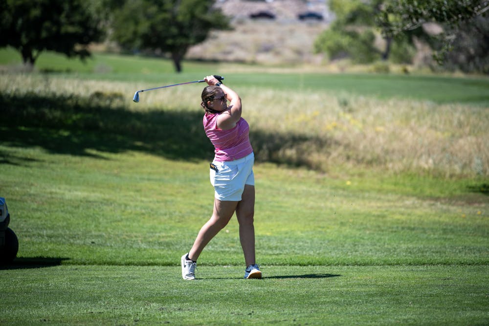 <p>Katie Scheck &#x27;26 slices the ball down the fairway at the Dick McGuire Invitational in Albuquerque, N.M on Sept. 9. Courtesy of Michele Drinkard.</p>