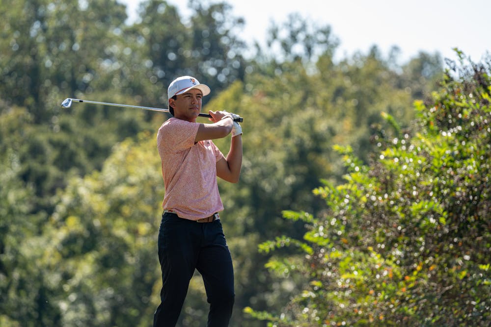 Josemarria Gutierrez '26 scopes out his iron shot. 
