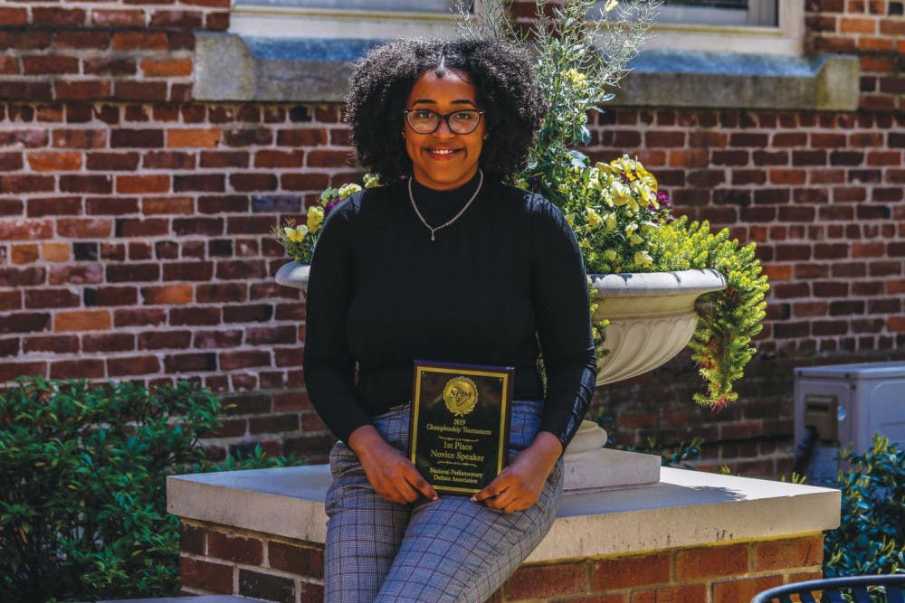 Yasmeen Hill poses with her first place Novice Speaker award. Hill is the second African-American woman to win the award.