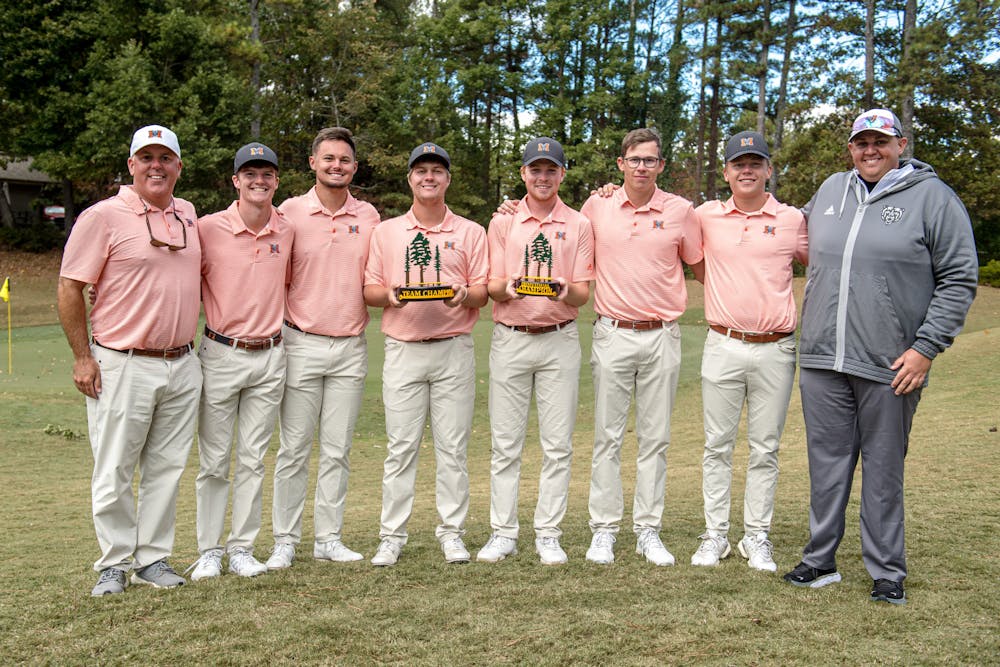 Mercer's Men's golf team poses with the team trophy they earned at the Pinetree Intercollegiate. Tobias Jonsson (middle right) is holding the individual championship trophy that he earned in the tournament. The team placed first of 11 team in Kennesaw on Monday and Tuesday. 