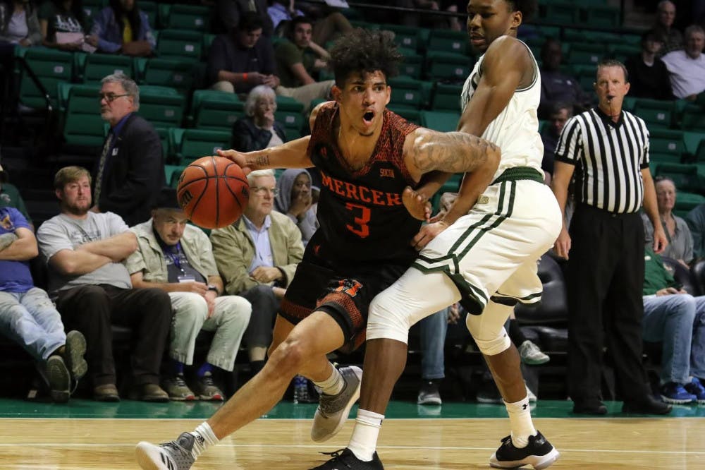 Marcus Cohen (#3) attempts a drive in game against UAB. Photo provided by Mercer Athletics.
