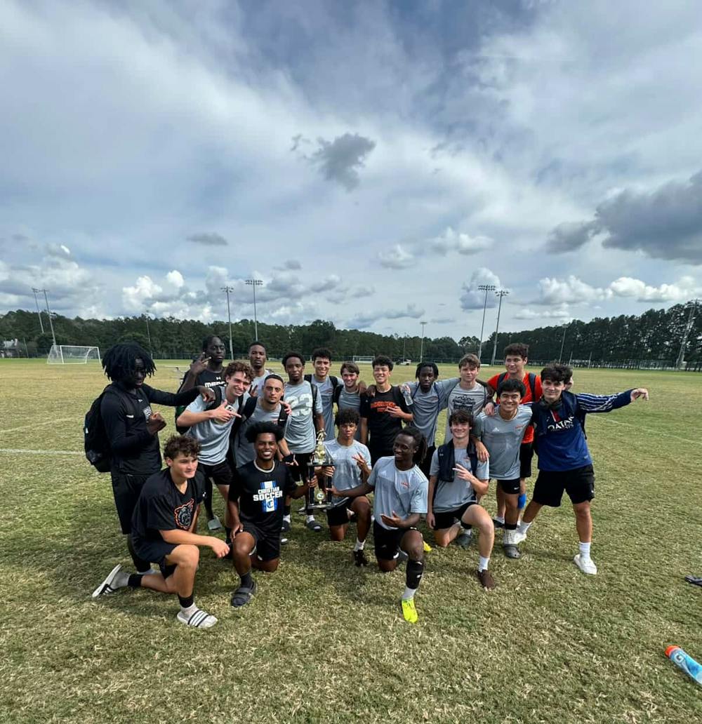 <p>The Mercer Men&#x27;s Club Soccer team posing with their first-place trophy on Sept. 28. after going undefeated in the Georgia Southern State Championship.</p>