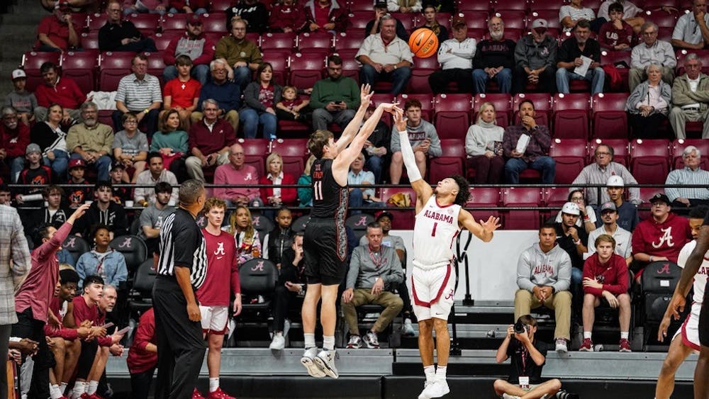 Robby Carmody attempts a field goal for the Bears against #22 University of Alabama on Nov. 17. The Bears lost the game, 98-67.