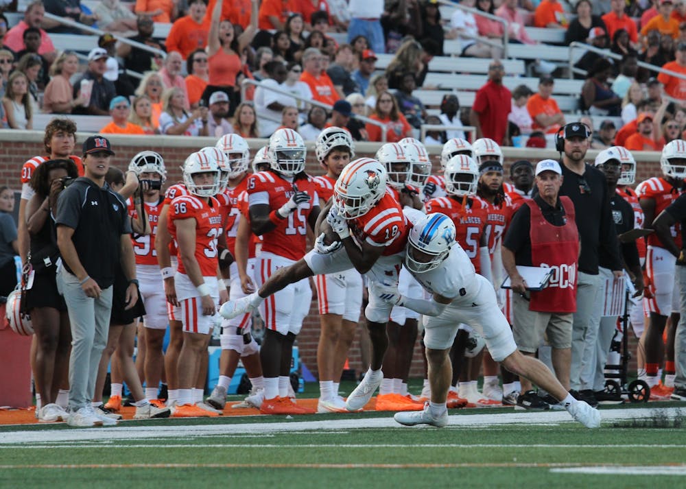Wide receiver Adjatay Dabbs '28 pulls down a contested catch against Presbyterian on August 30. 