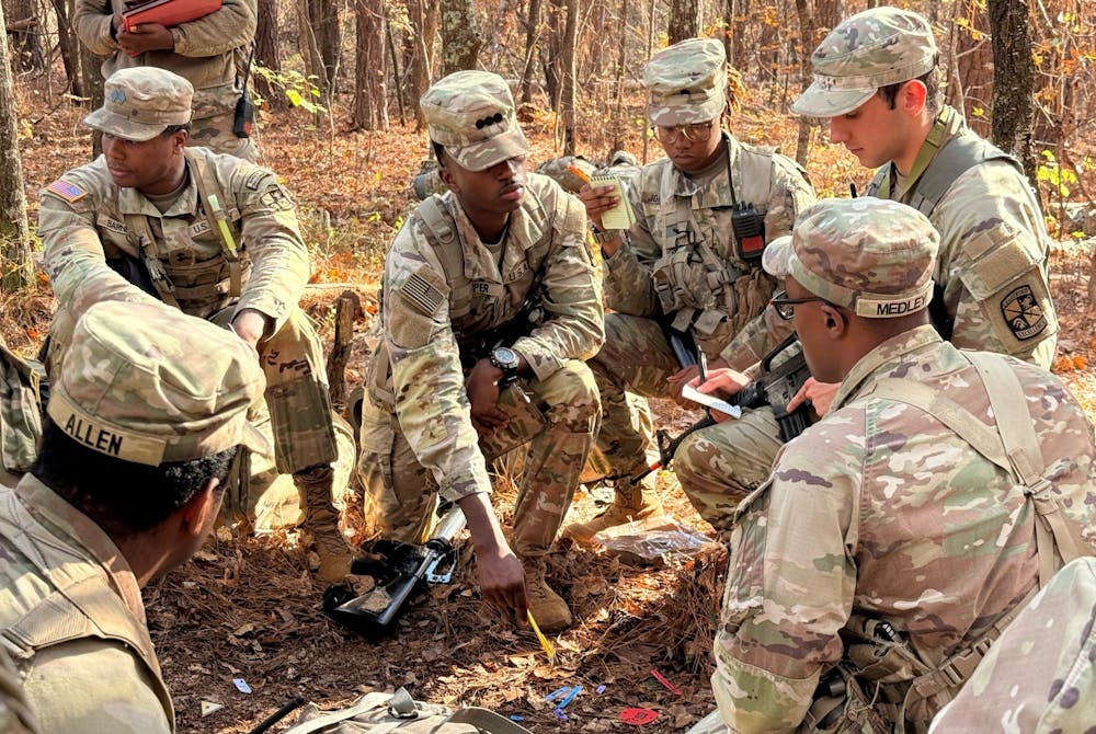 Tory Hopper '26 (center) conducts a mission brief to his subordinates at the Fall 2025 Semester Field Training Exercise. Here, students gain field experience and are evaluated on their performance, leadership and decision-making skills. Photo courtesy of Xavier Rogers.
