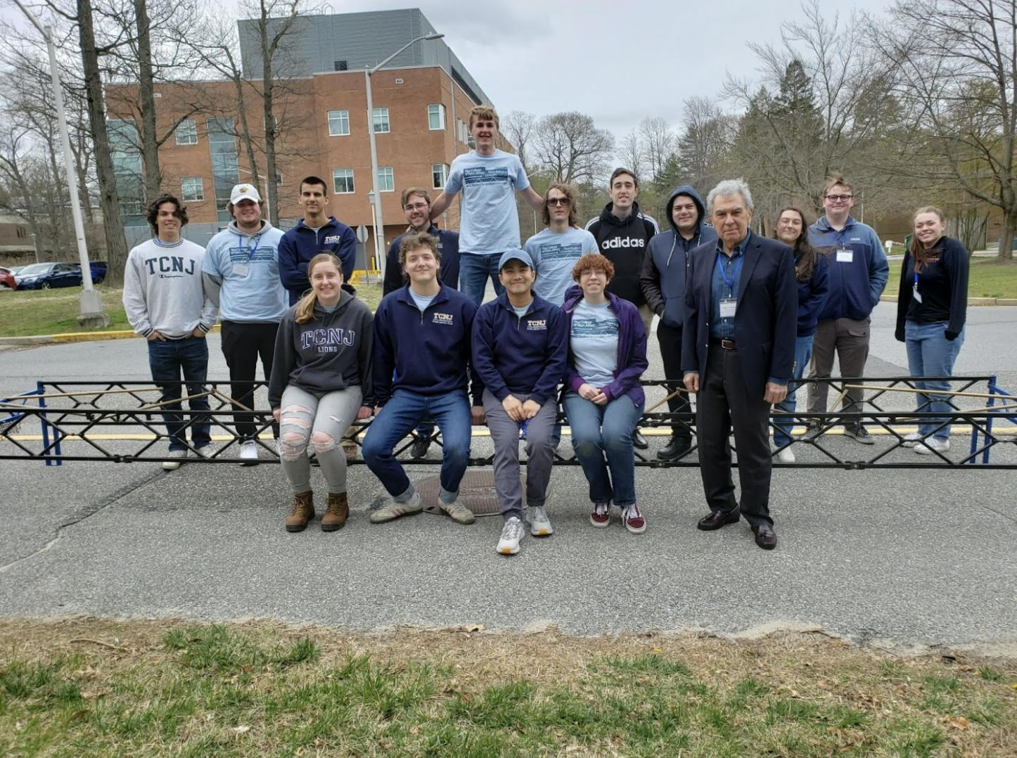 The group of civil engineers from the College along with Professor Nabil Al-Omaishi in front of the constructed steel bridge (Photo courtesy of Vedrana Krstic). 