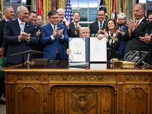 President Trump signs the funding bill to end the 43-day government shutdown in the Oval Office. (Photo courtesy of Wikimedia Commons)