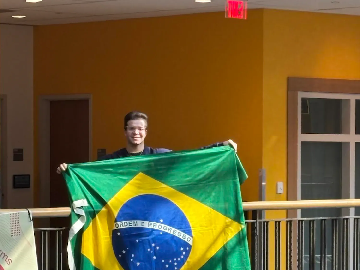 Enzo Manfredi encourages students to “Get involved” at TCNJ by joining “BRASA” in the spring semester. (Photo by Isabella McHugh)