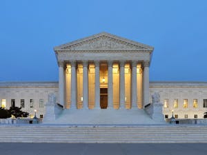 On Nov. 14, the Supreme Court is expected to reevaluate and discuss U.S. v. Rahimi, a domestic violence case that has the potential to renew the precedent on future gun control laws (Photo courtesy of Wikimedia Commons/“Panorama of United States Supreme Court Building at Dusk” by Joe Ravi. October 10, 2011). 