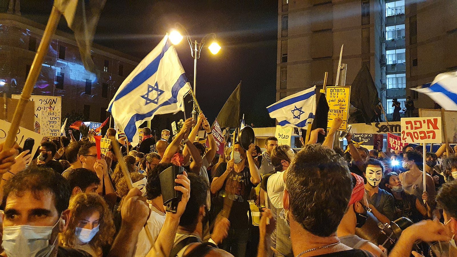 Mass protests have been taking place across Israel in opposition to Prime Minister Benjamin Netanyahu’s judicial overhaul plans (Photo courtesy of Wikimedia Commons/“Flags at Protests against Netanyahu 2020 Jerusalem” by Nir Hirshman Communications. August 1, 2020). 