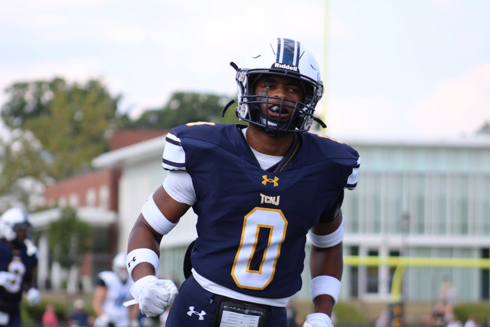 <p><em>Senior Amir Vick had an interception against Muhlenberg (Photo courtesy of Elizabeth Gladstone). ﻿</em></p>