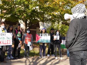 In between marches, student speakers recited chants and spoke about the Israel-Palestine war (Photo courtesy of Aiman Shaikh).