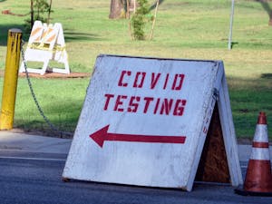 Members of the campus community have mixed reactions to the College’s decision to discontinue COVID-19 offerings. (Photo courtesy of Flickr/“COVID Testing Dodger Stadium” by Chris Yarzab/Aug. 10, 2020)