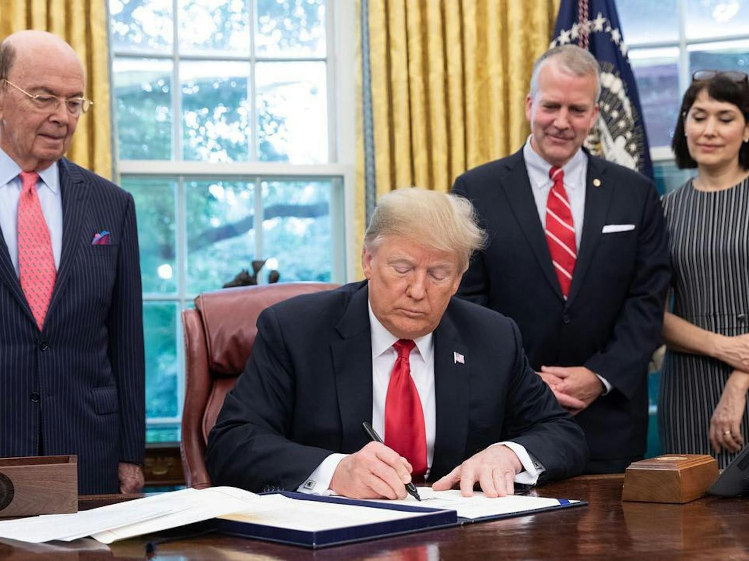 President Trump enacts a wave of executive orders reshaping immigration, diversity policies, and more. (Photo courtesy of Wikimedia Commons / United States Senate, October 11, 2018)