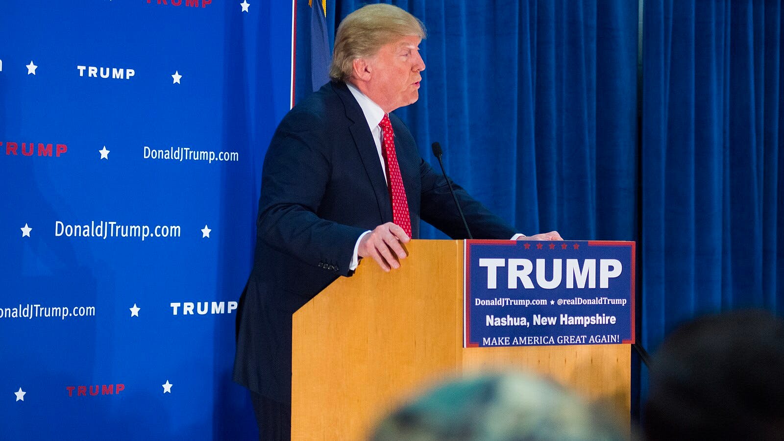 (Photo courtesy of Wikimedia Commons / “Donald Trump Nashua 2015” by Marc Nozell. CC-BY-2.0. December 28, 2015). 