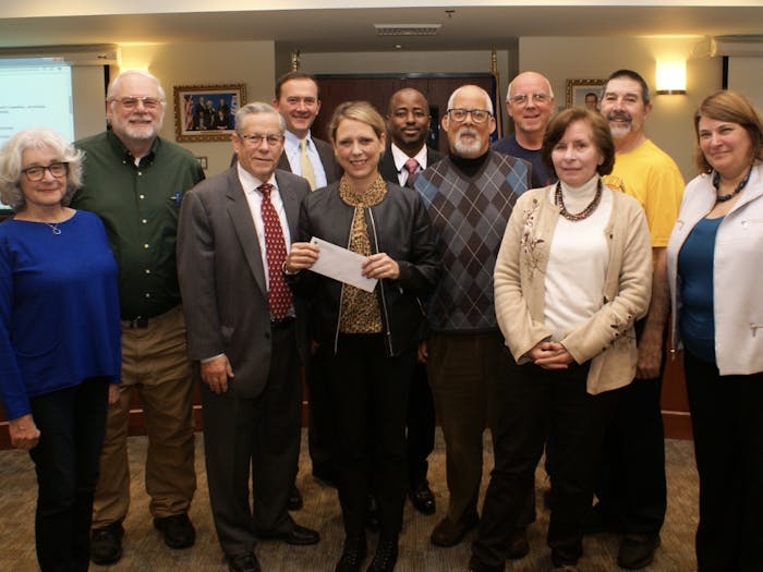 Ewing Green Team presents $990 donation to HomeFront after the fifth annual Ewing Fall Spin (Photo courtesy of the Sustainable Ewing Green Team). 
