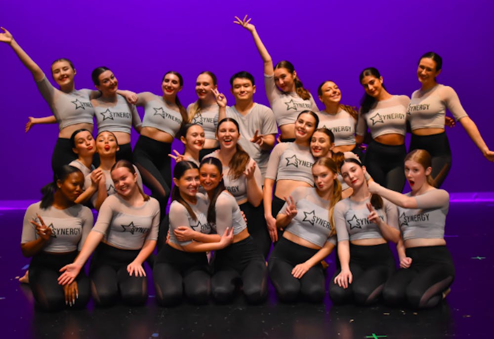 <p>Synergy Dance Company poses for the camera (Photo courtesy of Lauren Schweighardt).</p><p><br/></p>