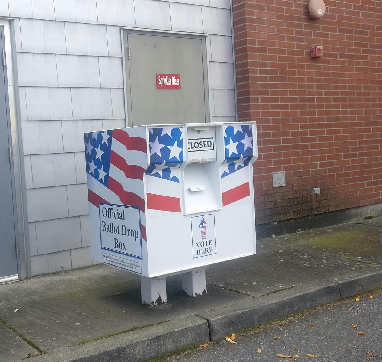 Officials are investigating two incidents in which two ballot drop boxes in Oregon and Washington were set on fire (Photo courtesy of Wikimedia Commons / “Ballot Drop Box” by Cliffordsnow. September 28, 2020). 