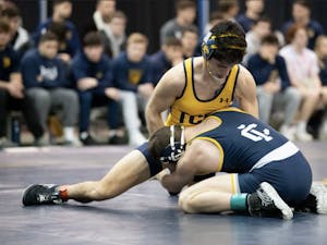 The College’s Wrestling in loss to Ithaca College (Photo Courtesy of Jimmy Alagna).