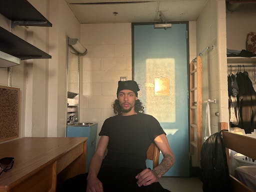 Maleki Johnson in his Wolfe dorm on March 31. (Photo by Gloria Vittadello)