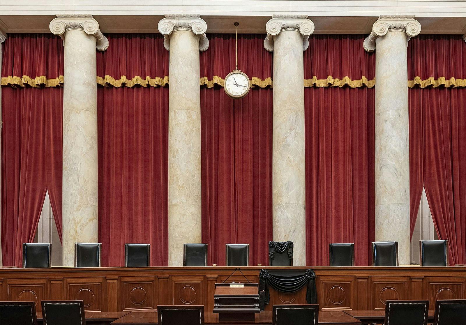 On Nov. 13, the Supreme Court made a decision that will forever alter the structure of American government (Photo courtesy of Wikimedia Commons/“Courtroom of the Supreme Court with Associate Justice Ruth Bader Ginsburg’s chair and the bench in front of her seat draped in black” by Fred Schilling, Collection of the Supreme Court of the United States. PD US SCOTUS. September 19, 2020). 