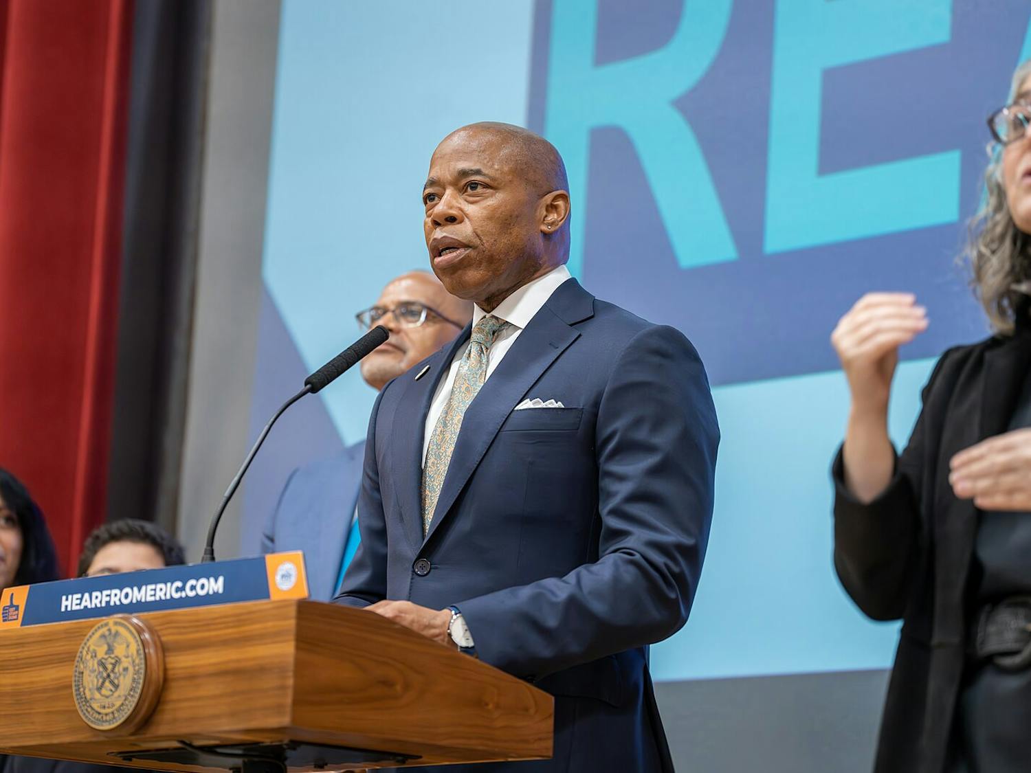 New York City Mayor Eric Adams intensely advocated for Congress and the Biden administration to take action in helping the city deal with the exceeding numbers of migrants entering the city shelter systems (Photo courtesy of Wikimedia Commons/“NYC SCHOOLS CHANCELLOR ANNOUNCES NYC READS” by New York City Public Schools Press Office. May 9, 2023).