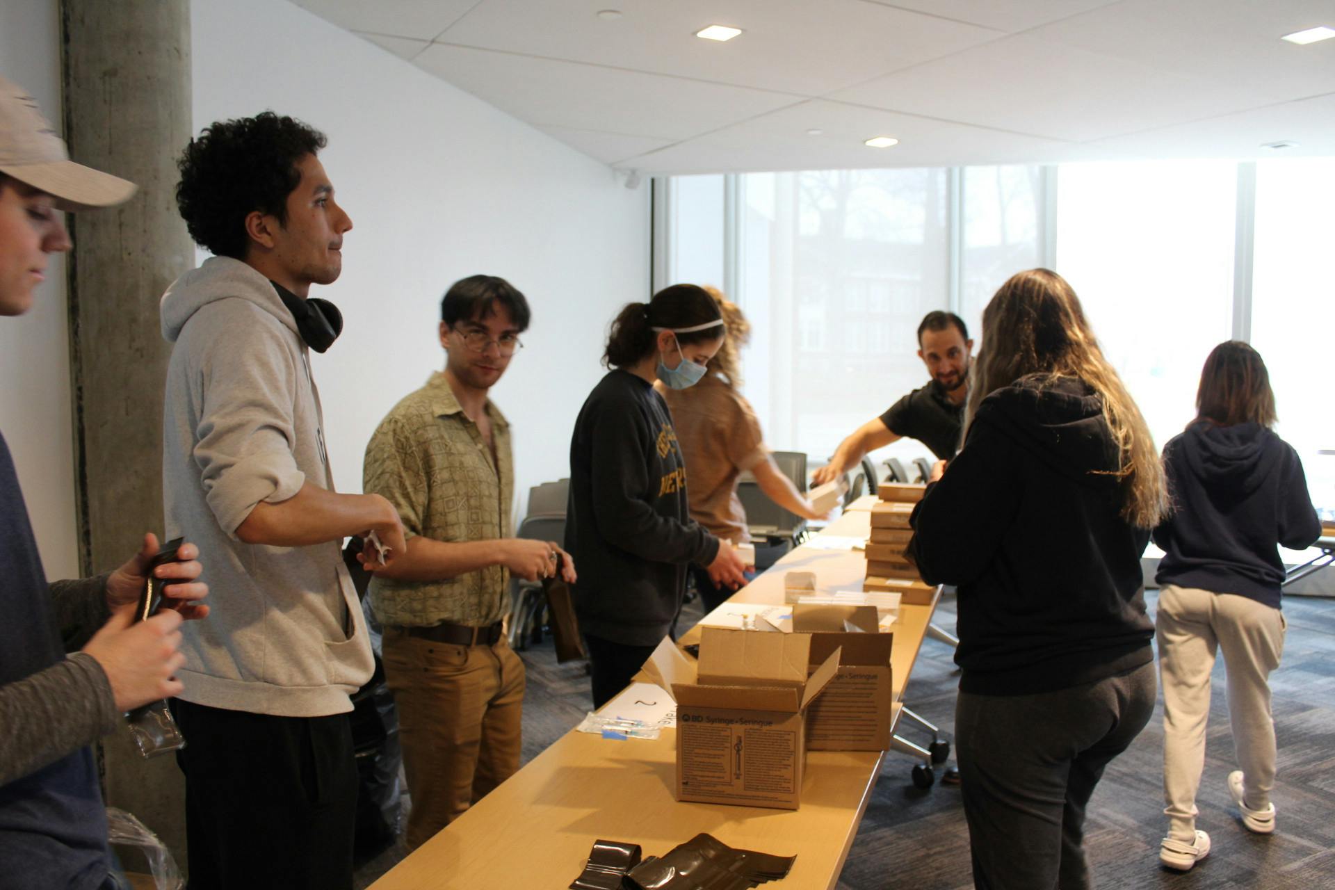 Students preparing life saving Naloxone kits in the Brower Student Center (Elizabeth Gladstone / Photographer).