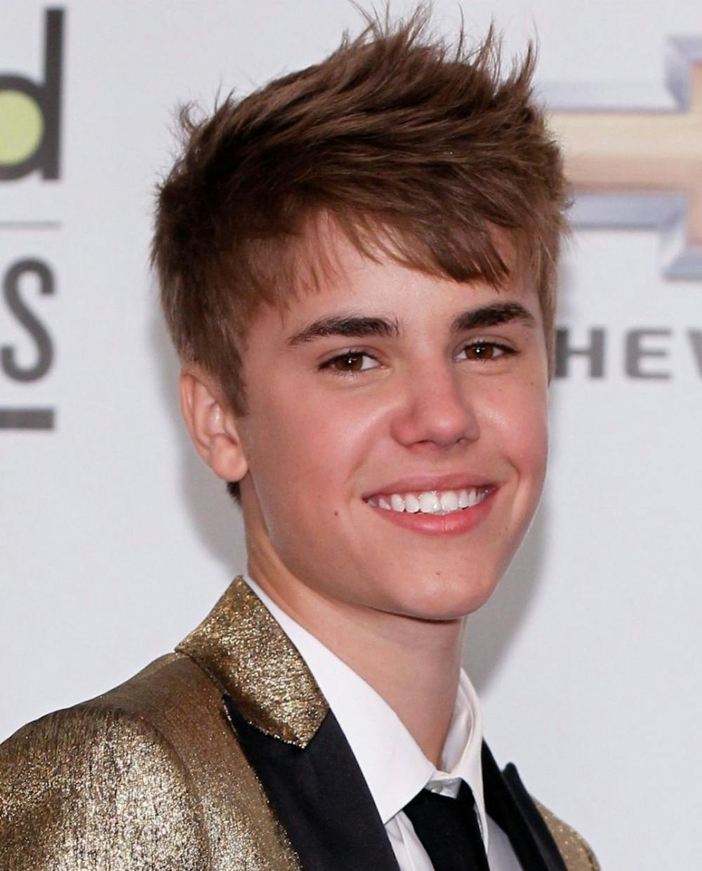 <p><em>Justin Bieber returns to the stage at NHL afterparty. (Photo courtesy of </em><a href="https://flic.kr/p/apGfsK" target=""><em>Flickr</em></a><em> / “Justin Bieber Billboard Music Awards 2011-12” by iLoveJB123 / September 23, 2011)</em></p>