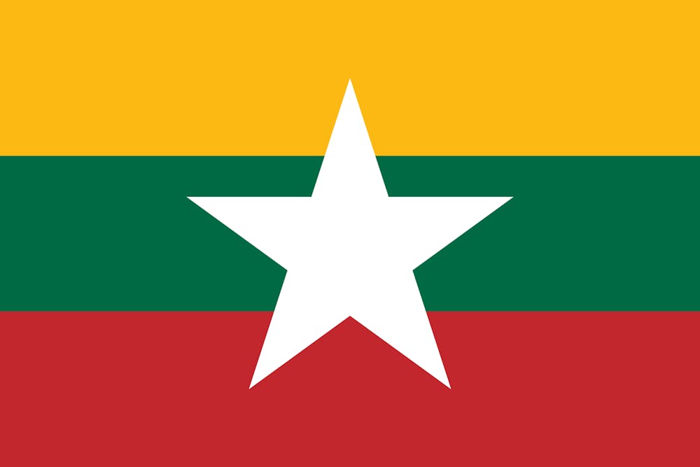 <p><em>The people of Myanmar have been routinely subject to abuses and bombardment by their own government, in the two years since a military coup replaced democratically elected Aung San Suu Kyi and members of her National League for Democracy party (Photo courtesy of Wikimedia Commons/“</em><a href="https://commons.wikimedia.org/wiki/File:Flag_of_Myanmar_(Lithuania_colors).svg" target=""><em>Flag of Myanmar (Lithuania colors)</em></a><em>” by Glide08. December 28, 2020). </em></p>