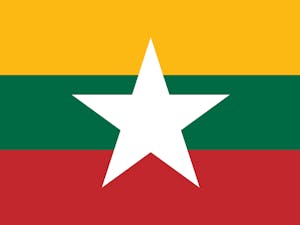 The people of Myanmar have been routinely subject to abuses and bombardment by their own government, in the two years since a military coup replaced democratically elected Aung San Suu Kyi and members of her National League for Democracy party (Photo courtesy of Wikimedia Commons/“Flag of Myanmar (Lithuania colors)” by Glide08. December 28, 2020). 