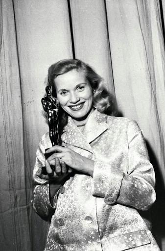 Saint poses with her Academy Award for “On the Waterfront.” (Photo courtesy of IMDb)