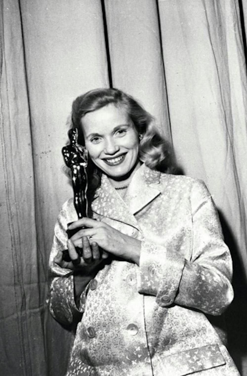 <p><em>Saint poses with her Academy Award for “On the Waterfront.” (Photo courtesy of </em><a href="https://www.imdb.com/name/nm0001693/mediaviewer/rm591936512/" target=""><em>IMDb</em></a><em>)</em></p>