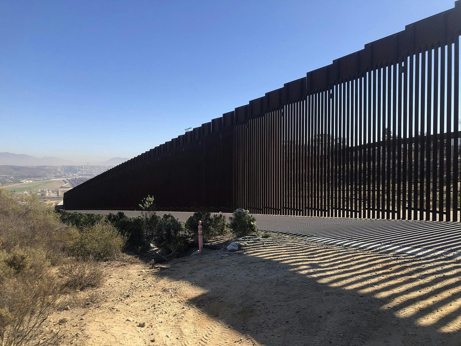In a reversal of one of the key points of the president’s platform, the Biden administration announced that it would begin construction on up to 20 miles of wall at the U.S.-Mexico border (Photo courtesy of Wikimedia Commons/“U.S - Mexico Border Wall” by Amyyfory. November, 26, 2021). 