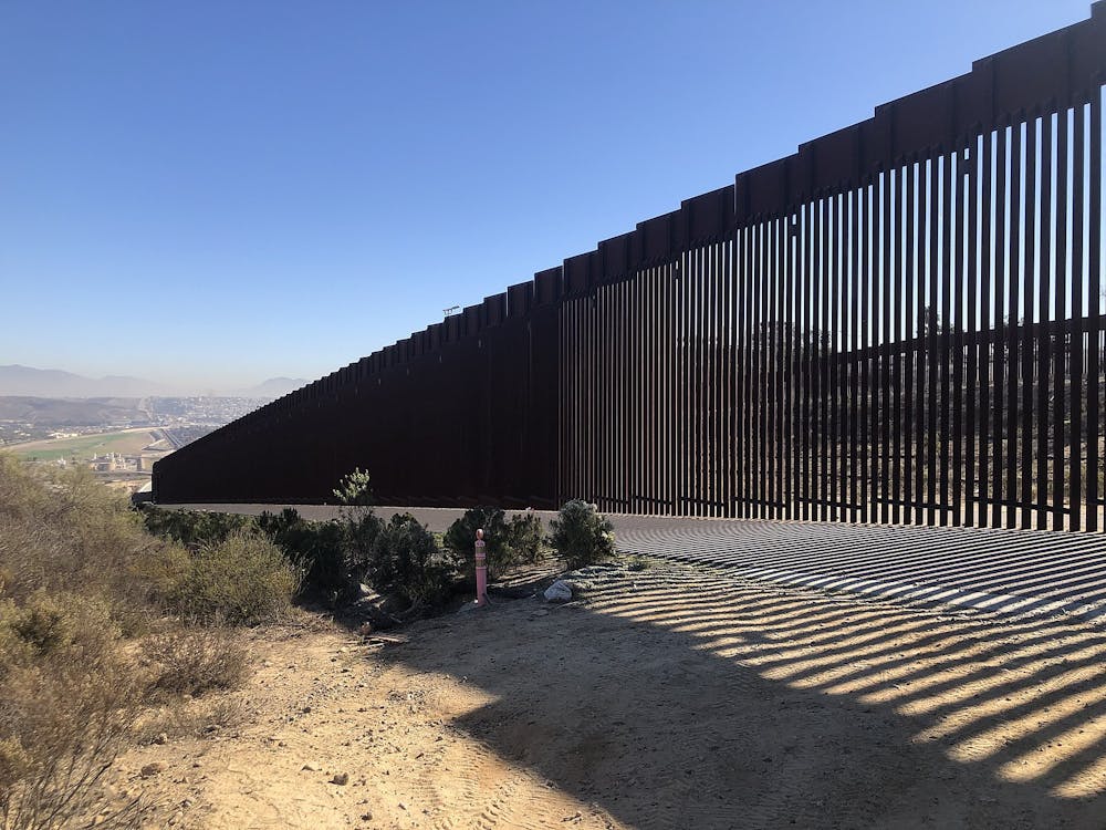 <p><em>In a reversal of one of the key points of the president’s platform, the Biden administration announced that it would begin construction on up to 20 miles of wall at the U.S.-Mexico border (Photo courtesy of Wikimedia Commons/“</em><a href="https://commons.wikimedia.org/wiki/File:U.S_-_Mexico_Border_Wall.jpg" target=""><em>U.S - Mexico Border Wall</em></a><em>” by Amyyfory. November, 26, 2021). </em></p>