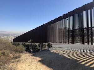 In a reversal of one of the key points of the president’s platform, the Biden administration announced that it would begin construction on up to 20 miles of wall at the U.S.-Mexico border (Photo courtesy of Wikimedia Commons/“U.S - Mexico Border Wall” by Amyyfory. November, 26, 2021). 