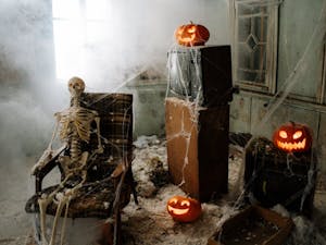 Fog, cobwebs and skeletons grab some candy to get ready for the spooky season. (Photo courtesy of Pexels)