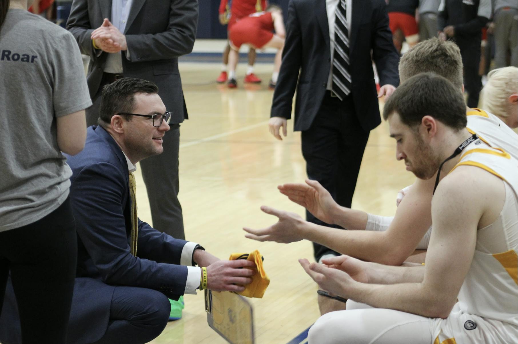 Head coach Matthew Goldsmith speaking to his team (Photo courtesy of Elizabeth Gladstone / Multiamedia Coordinator).
