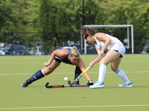 Sophomore defender Emily Dvorsky making a stop (Photo courtesy of Elizabeth Gladstone / Multimedia Coordinator).