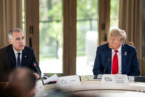 President Donald Trump passes a series of Executive Orders banning several Canadian imports. (Courtesy of Wikimedia Commons)  