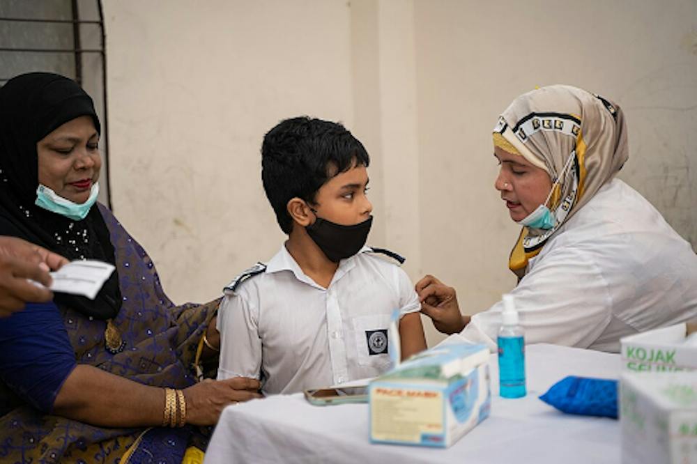 <p><em>Measles vaccines are being administered to children in Bangladesh via immunization campaigns assisted by global health organizations. (Photo courtesy of </em><a href="https://commons.wikimedia.org/wiki/File:The_United_States_Delivers_COVID-19_Vaccines_to_Bangladesh.jpg" target=""><em>Wikimedia Commons</em></a><em>)</em></p><p><br/><br/></p>